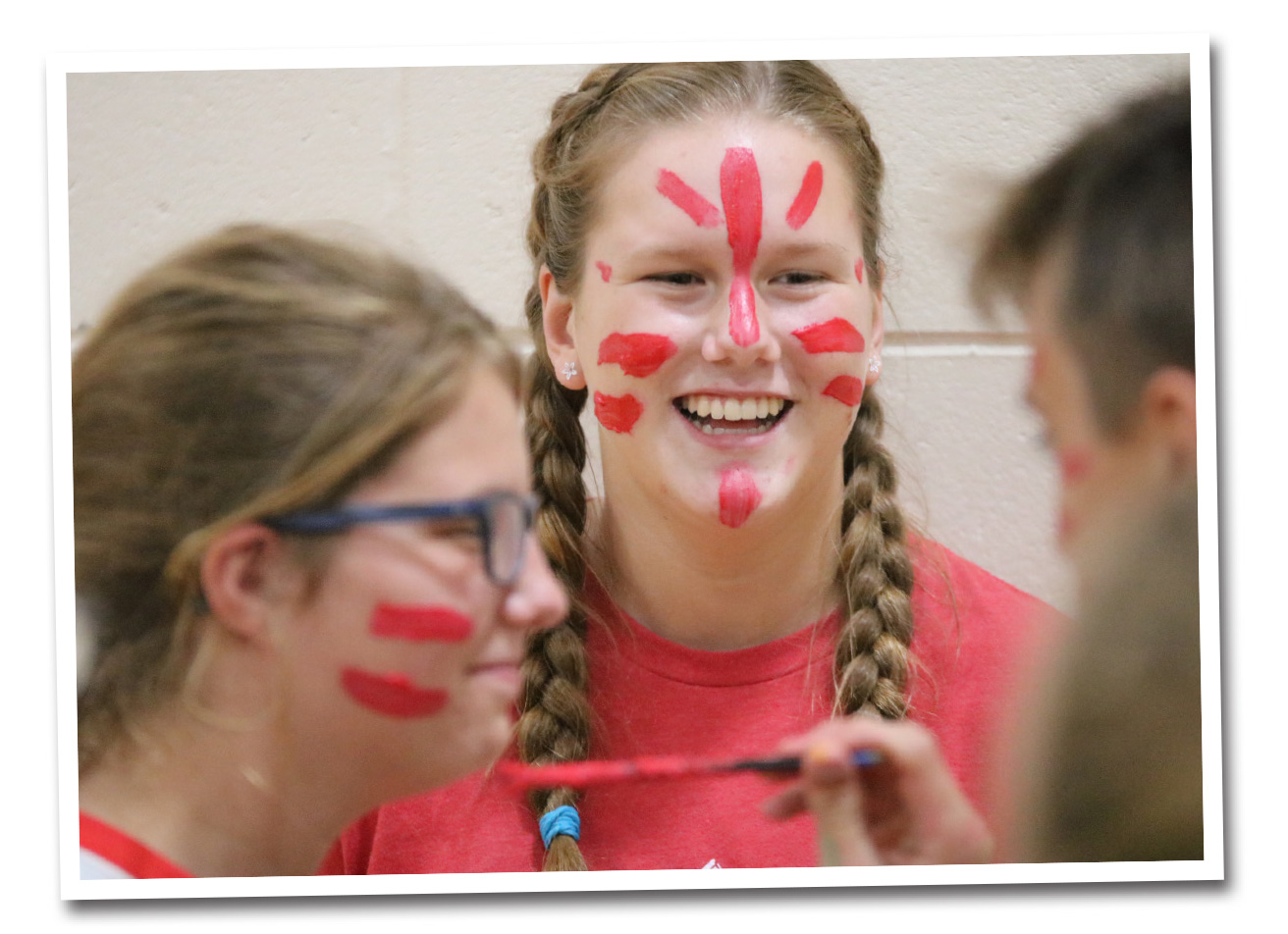 Students paint faces