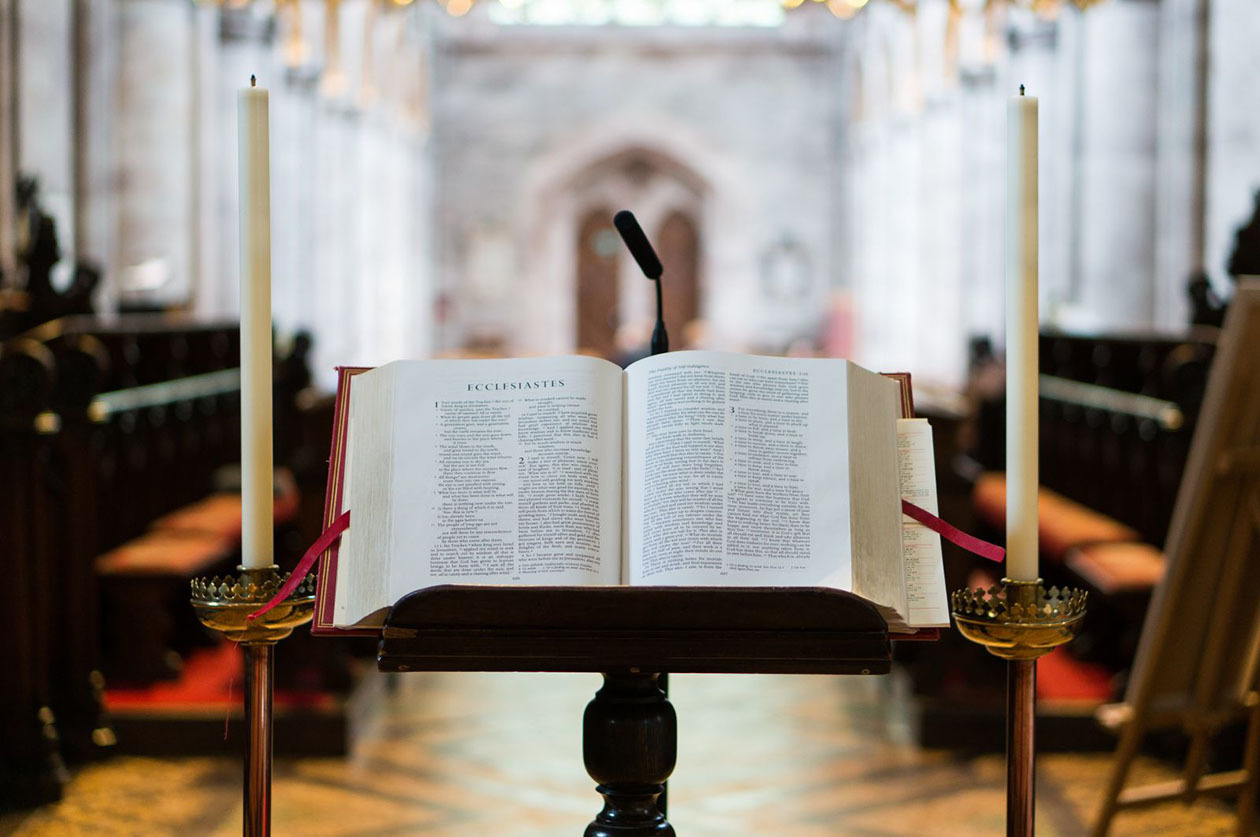 A Bible at the front of the church lies open to Ecclesiastes in Hereford, UK